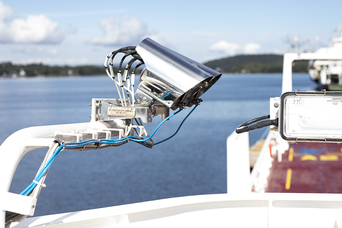 Marine-grade monitoring camera mounted on a vessel deck